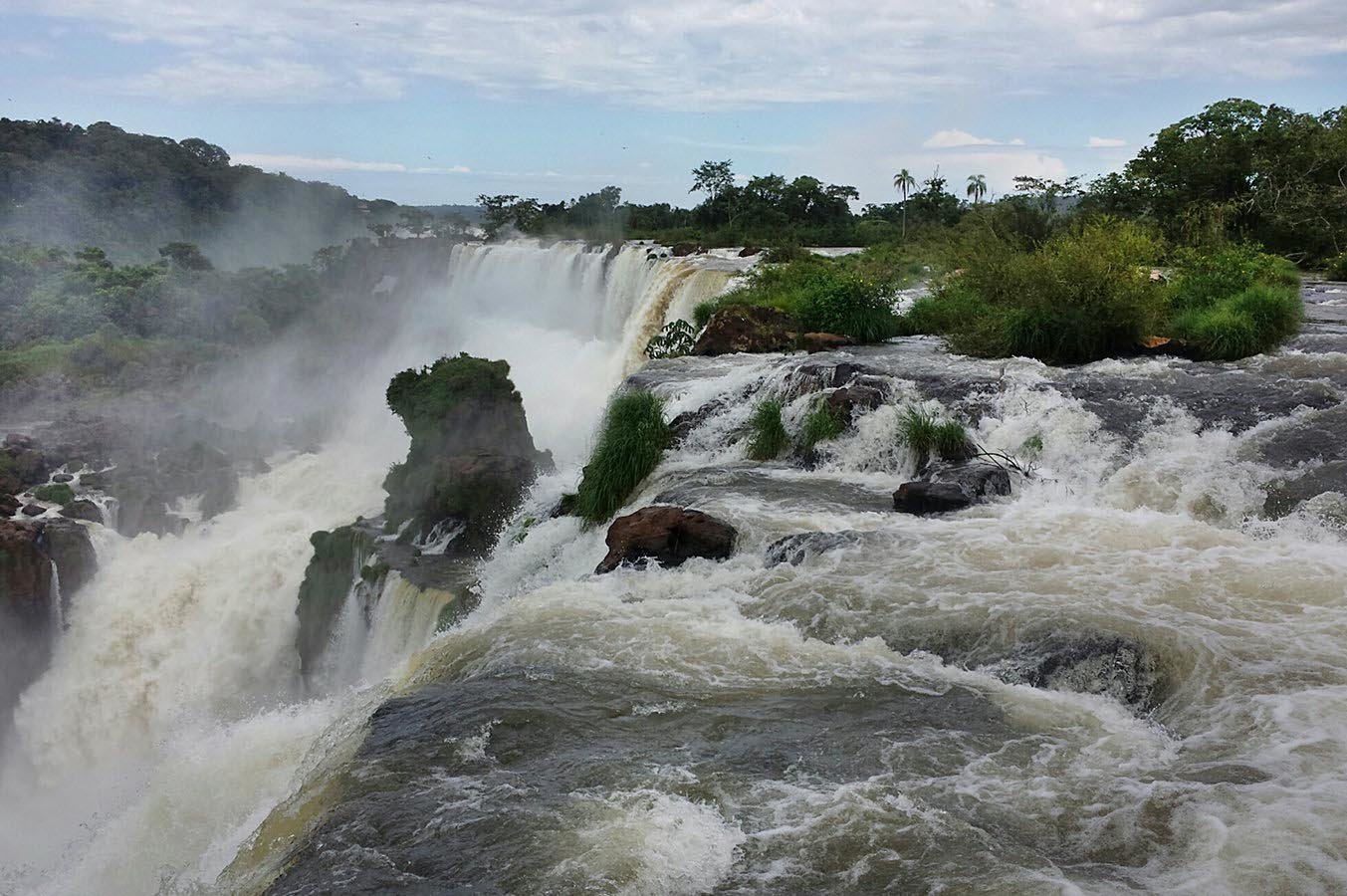The majestic Iguazu Falls are comprised of a system of 275 waterfalls located in the Atlantic rainforest